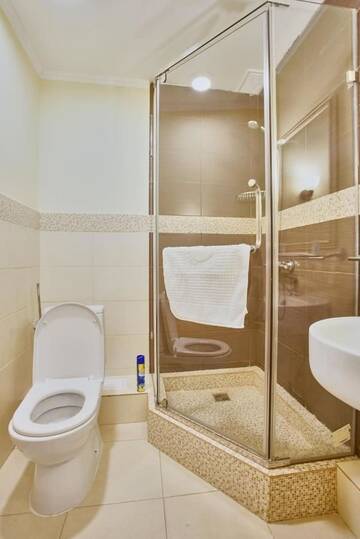 Фото номера Двухместный номер с 2 отдельными кроватями Отель Jasmine Hotel г. Нур-Султан 5