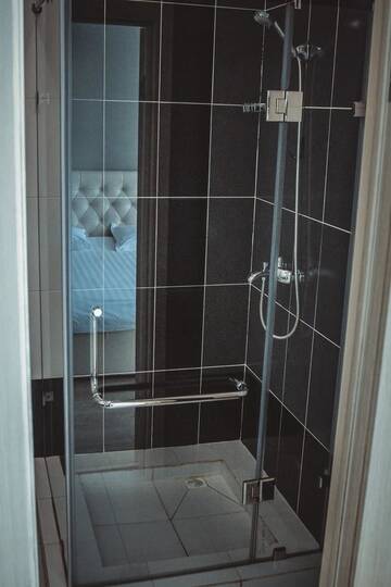 Фото номера Двухместный номер с 2 отдельными кроватями Отель Royal M г. Нур-Султан 6