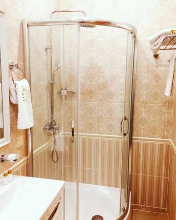 Фото номера Одноместный номер с балконом Отель Altyn Hotel г. Нур-Султан 4
