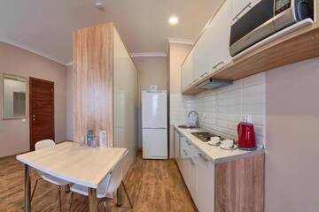 Фото номера Номер с кроватью размера «king-size» Апарт-отели Aisha Bibi Apart-Hotel г. Нур-Султан 8