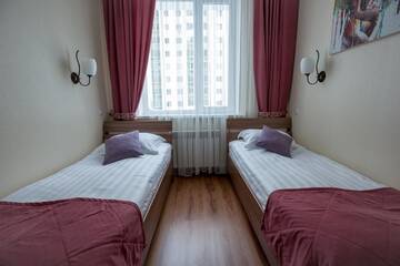 Фото номера Двухместный номер с 2 отдельными кроватями Отель MAXX inn г. Нур-Султан 2