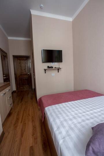 Фото номера Номер с кроватью размера «queen-size» Отель MAXX inn г. Нур-Султан 4