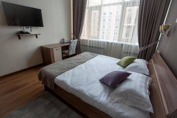 Фото номера Номер с кроватью размера «king-size» Отель MAXX inn г. Нур-Султан 14