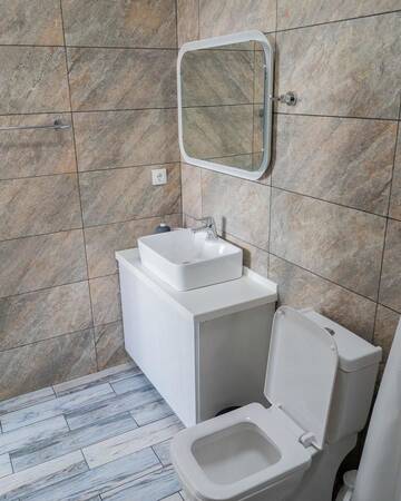Фото номера Семейный номер с ванной комнатой Отели типа «постель и завтрак» Arai Halal Apartments г. Нур-Султан 4