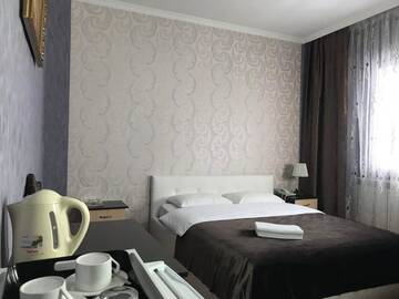 Фото номера Просторный двухместный номер с 2 отдельными кроватями Отель Mini-Hotel Pulsar г. Нур-Султан 14