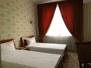 Фото номера Бюджетный двухместный номер с 2 отдельными кроватями Отель Boutique Hotel Tomiris г. Нур-Султан 5