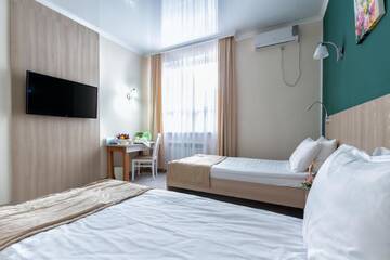 Фото номера Двухместный номер с 2 отдельными кроватями Отель AYKUN Hotel г. Нур-Султан 3