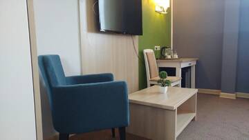 Фото номера Улучшенный двухместный номер с 1 кроватью Отель AYKUN Hotel г. Нур-Султан 5