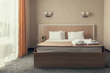 Фото номера Улучшенный двухместный номер с 1 кроватью Отель AYKUN Hotel г. Нур-Султан 3