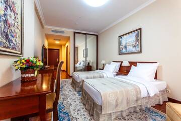 Фото номера Стандартный двухместный номер с 2 отдельными кроватями Отель Alanda Hotel г. Нур-Султан 4