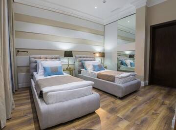 Фото номера Двухместный номер с 2 отдельными кроватями Отель QonaQ hotel г. Нур-Султан 8