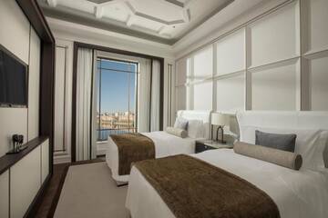 Фото номера Двухместный номер Делюкс с 2 отдельными кроватями Отель The St. Regis Astana г. Нур-Султан 12