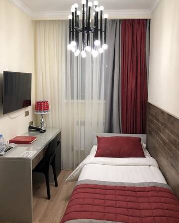 Фото номера Одноместный номер Делюкс Отель Grace Point Hotel г. Нур-Султан 2