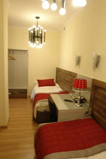 Фото номера Двухместный номер Делюкс с 2 отдельными кроватями Отель Grace Point Hotel г. Нур-Султан 3