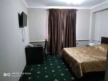 Фото номера Стандартный двухместный номер с 1 кроватью Отель Гостиница QAINAR HOTEL г. Нур-Султан 7