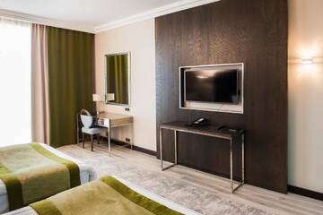 Фото номера Двухместный номер с 2 двуспальными кроватями Отель The ONE Hotel Astana г. Нур-Султан 6