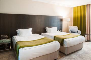 Фото номера Двухместный номер с 2 двуспальными кроватями Отель The ONE Hotel Astana г. Нур-Султан 7