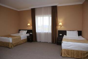 Фото номера Двухместный номер с 2 отдельными кроватями Отель Hotel Aner г. Нур-Султан 10