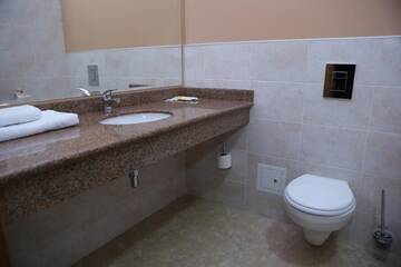 Фото номера Двухместный номер с 2 отдельными кроватями Отель Hotel Aner г. Нур-Султан 16