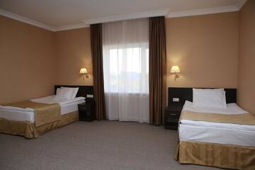 Фото номера Двухместный номер с 2 отдельными кроватями Отель Hotel Aner г. Нур-Султан 6