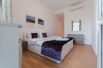 Фото номера Апартаменты с 2 спальнями Апартаменты The Arc Residence г. Нур-Султан 2
