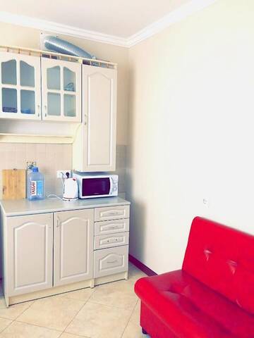 Фото номера Улучшенные апартаменты Апартаменты Khan Shatyr Apartment г. Нур-Султан 31
