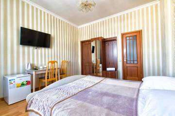 Фото номера Люкс с кроватью размера «king-size» и балконом Мини-отель Mini-Hotel Sultan г. Нур-Султан 5