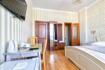 Фото номера Люкс с кроватью размера «king-size» и балконом Мини-отель Mini-Hotel Sultan г. Нур-Султан 6