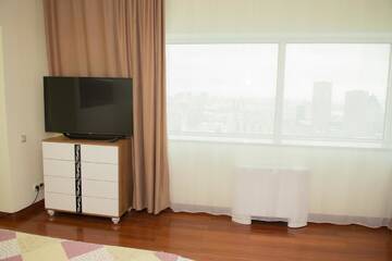 Фото номера Двухместный номер с 1 кроватью Апартаменты Apartments Severnoe Siyanie A Class г. Нур-Султан 2