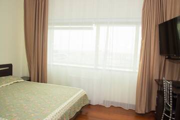 Фото номера Двухместный номер с 1 кроватью Апартаменты Apartments Severnoe Siyanie A Class г. Нур-Султан 4