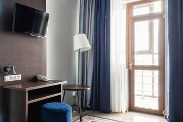 Фото номера Двухместный номер с 1 кроватью и балконом Отель NCityHotel г. Нур-Султан 3