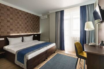 Фото номера Двухместный номер с 1 кроватью и балконом Отель NCityHotel г. Нур-Султан 8