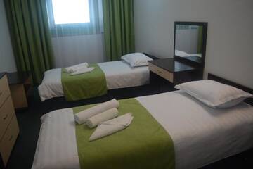 Фото номера Двухместный номер с 2 отдельными кроватями Отель AirportHotel г. Нур-Султан 4