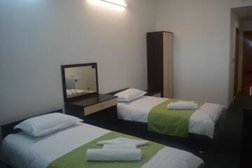 Фото номера Двухместный номер с 2 отдельными кроватями Отель AirportHotel г. Нур-Султан 5