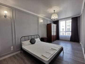 Фото номера Апартаменты с 1 спальней Апартаменты Central Park г. Нур-Султан 47