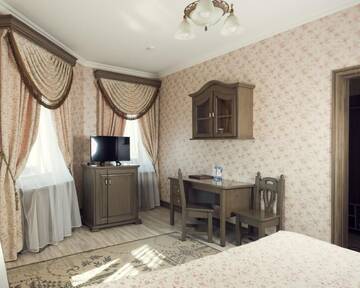 Фото номера Двухместный номер Делюкс с 1 кроватью Отель Boutique Hotel Traditional г. Нур-Султан 3