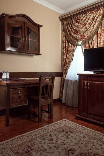 Фото номера Двухместный номер Делюкс с 1 кроватью Отель Boutique Hotel Traditional г. Нур-Султан 21