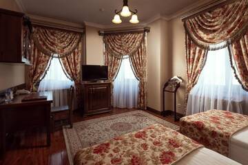 Фото номера Двухместный номер Делюкс с 1 кроватью Отель Boutique Hotel Traditional г. Нур-Султан 11