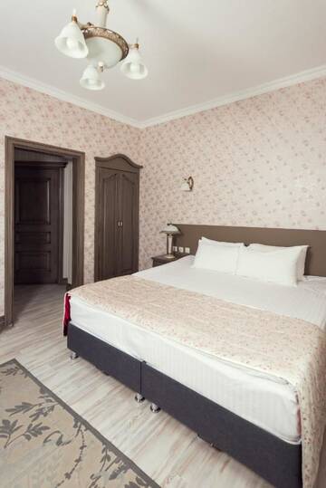 Фото номера Двухместный номер Делюкс с 1 кроватью Отель Boutique Hotel Traditional г. Нур-Султан 5