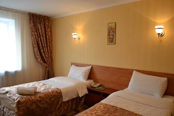 Фото номера Двухместный номер с 2 отдельными кроватями Отель Zhassybi Hotel г. Нур-Султан 2