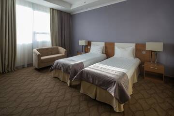 Фото номера Стандартный двухместный номер с 2 отдельными кроватями Отель Hotel Duman г. Нур-Султан 5