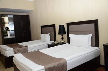 Фото номера Стандартный двухместный номер с 2 отдельными кроватями Отель Royal Park Hotel &amp; SPA г. Нур-Султан 7