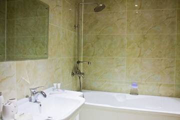 Фото номера Улучшенный двухместный номер с 1 кроватью Отель Sky Luxe Hotel г. Нур-Султан 5