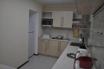 Фото номера Апартаменты с 2 спальнями Апартаменты Sunrise Apartments Triumph г. Нур-Султан 11