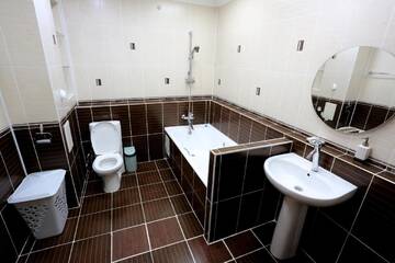 Фото номера Апартаменты с 2 спальнями Апартаменты Sunrise Apartments Triumph г. Нур-Султан 12