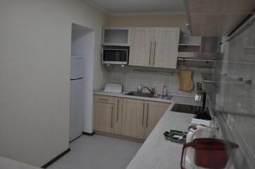 Фото номера Апартаменты с 2 спальнями Апартаменты Sunrise Apartments Triumph г. Нур-Султан 27